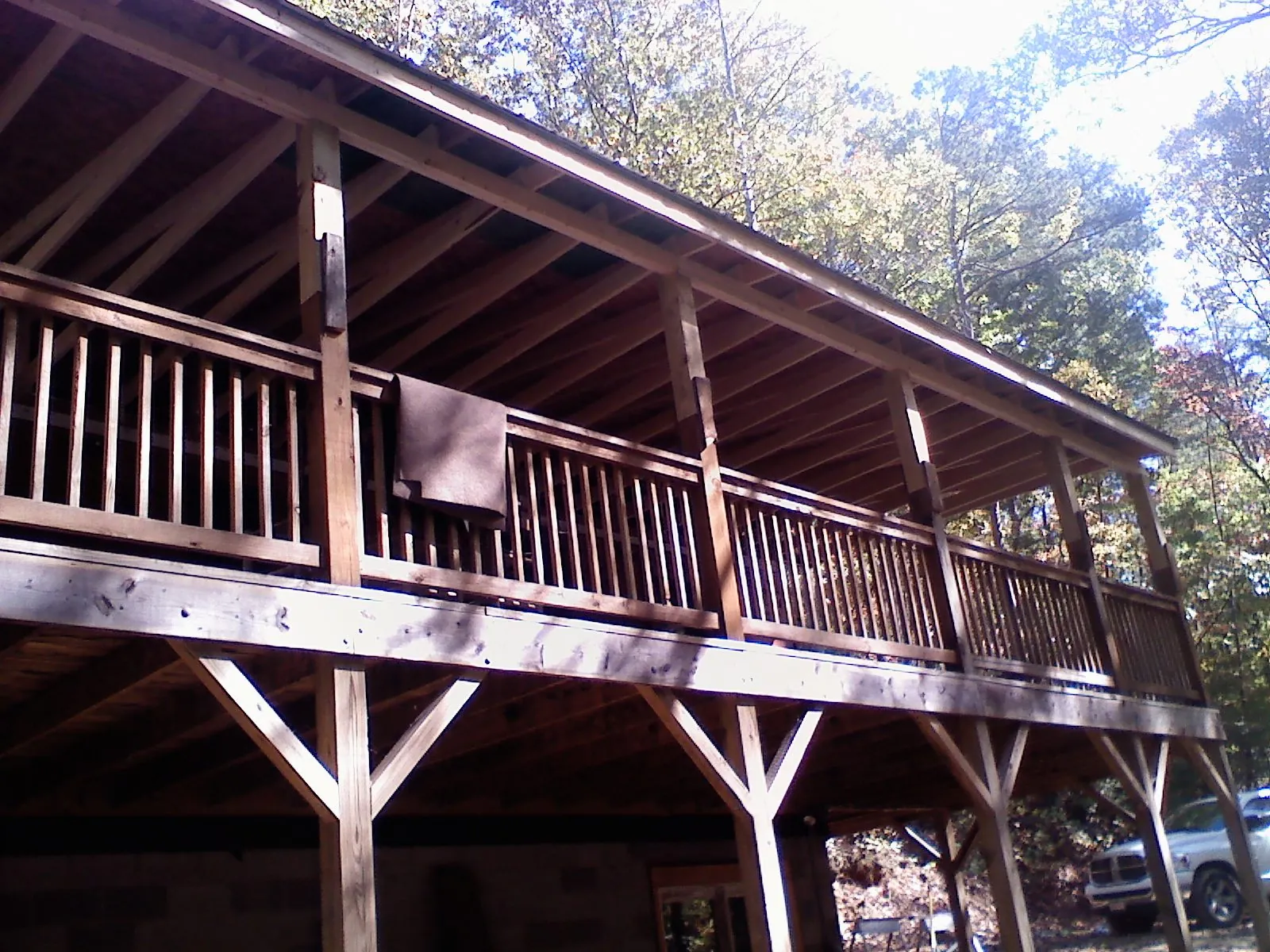 Timber framing under a new elevated porch and deck — Roof Leak Repair in Montevallo by Roofing Brothers